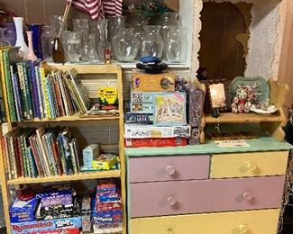 Dresser children’s books vases board game decorations