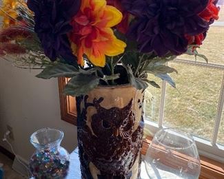 Owl vase with floral arrangement
