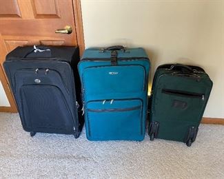 assorted suitcases