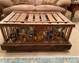 Real vintage chicken coop used as a coffee table