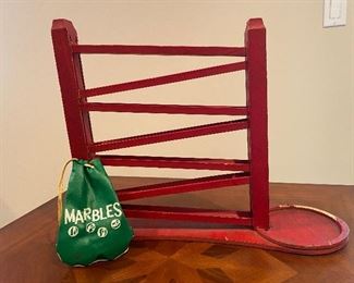 Vintage Red Marble Roller with marbles 