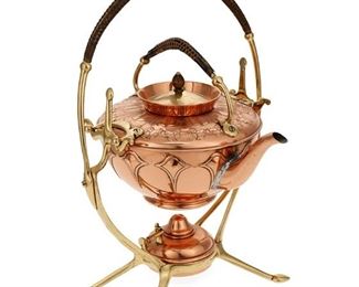 1002
A WMF Jugendstil Copper Tea Kettle
First-Quarter 20th Century; Germany
With impressed WMF ostrich mark; Numbered: 50
The German copper and brass tilting kettle with repousse Art Nouveau designs and rattan handle raised on a stand with a burner
15.25" H x 10.25" W x 9.75" D
Estimate: $300 - $500