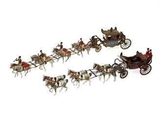 1017
A Group Of Britains Ltd. Horse Drawn Carriage Lead Toys
Mid-20th Century; England
Each marked for Britains
Each painted, die-cast lead, comprising a Queen of England coronation carriage (4" H x 20.75" W x 2.5" D) and a King and Queen coach (3.5" H x 12" W x 2.25" D), 2 pieces
Estimate: $300 - $500