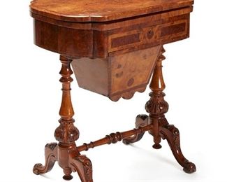 1018
A Small Continental Game Table
First-Quarter 20th Century
The flip top revealing parquetry inlaid gaming boards over a fitted drawer and a pull-out inset basket
26.75" H x 24" W x 16.125" D
Estimate: $300 - $500