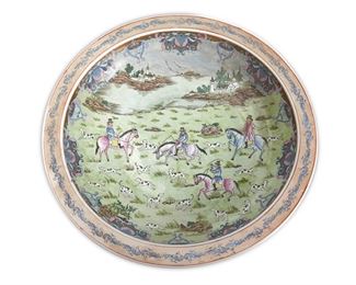 1022
A Large Chinese Porcelain Charger
20th Century
The glazed porcelain charger with a polychrome enamel decorated European hunting scene
4" H x 24" Dia.
Estimate: $400 - $600