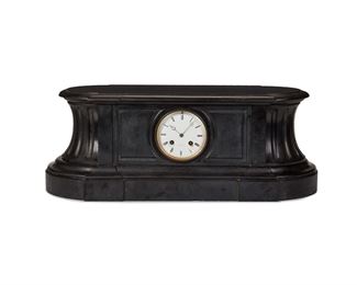 1025
A Slate Tiffany & Co. Mantle Clock
Late 19th/Early 20th Century
Dial marked: Tiffany & Co.
The mantle clock with a white enameled dial, black Roman numeral hour markers, outer minute track, and two train movement with a glazed brass bezel set in an architectural carved slate case
9.75" H x 25.5" W x 10" D
Estimate: $600 - $800
