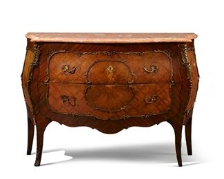 1033
A Louis XV-Style Commode
First-Quarter 20th Century
The marble top over a two-drawer dresser raised on slightly outswept legs
33" H x 47" W x 20.5" D
Estimate: $300 - $500