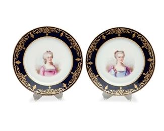 1036
Two Sèvres Porcelain Portrait Plates
Mid-19th Century
Each with printed crowned script "LP SEVRES 1844" circular mark in blue, printed crowned sunburst "Chateau de F. Bleau" mark in red, and printed lozenge date mark "S 37" in green; with rubbed titles verso
Each white glazed porcelain centering female portrait within a gilt-painted cobalt blue border, 2 pieces
Each: 1" H x 9.75" Dia.
Estimate: $200 - $400