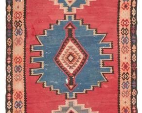 1050
A Kilim Runner
Mid-20th Century
Wool on cotton foundation, with polychrome geometric motifs
123" L x 57.5" W
Estimate: $300 - $500