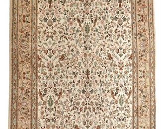 1052
An Indian Area Rug
Fourth-Quarter 20th Century
Wool on cotton foundation, with polychrome floral motifs on an ivory field
130" L x 96" W
Estimate: $600 - $800