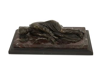 1071
A Continental Bronze Sculpture Of A Recumbent Figure
Late 19th/Early 20th Century
Possibly a funerary sculpture, raised on a stepped stone base
2.5" H x 9.75" W x 5" D
Estimate: $200 - $400