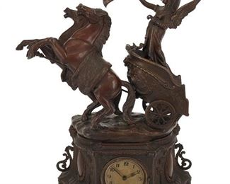 1076
A Spelter Figural Mantle Clock
Late 19th/Early 20th Century
Impressed: JM / Made in Belgium / [illegible]
With metal dial with black Arabic numeral hour markers, outer minute track, and single train movement set in an architectural cast spelter case with a winged figure driving a chariot
21" H x 17" W x 6" D
Estimate: $400 - $600