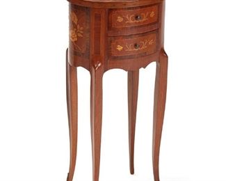 1091
A Small French Marquetry Occasional Table
First-Quarter 20th Century
The small, oval table with floral marquetry and two short drawers
28.375" H x 13.75" W x 10.75" D
Estimate: $200 - $400