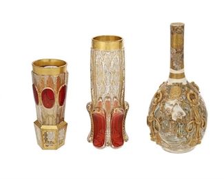 1106
A Group Of Gilt Table Objects
19th/20th Century
Comprising two Moser ruby flashed art glass vases (8.875" H x 3.5" Dia. and 7" H x 2.875" Dia.) and a Japanese Satsuma vase (10.25" H x 5.25" Dia.), 3 pieces
Estimate: $300 - $500