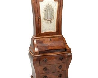 1133
An Italian Baroque-Style Secretary
19th Century or earlier
With "Made in Italy" paper labels to verso
The wood veneered, bombé-form secretary with a two-shelf cabinet with inset painted panel door over a drop-front compartment with two interior drawers and three long drawers
71" H x 28.5" W x 16" D
Estimate: $800 - $1,200