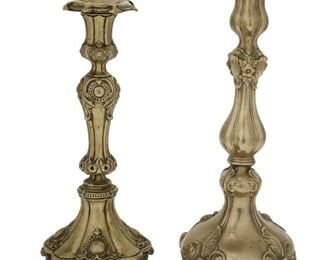 1137
Two Continental Silver Candlesticks
19th Century
One marked: 82; One appears unmarked
Each hollow silver candlestick with repousse foliate motifs, 2 pieces
Larger: 13" H x 5.25" W x 5.25" D; Smaller: 11.75" H x 5" W x 5" D
21.47 oz. troy approximately
Estimate: $300 - $500