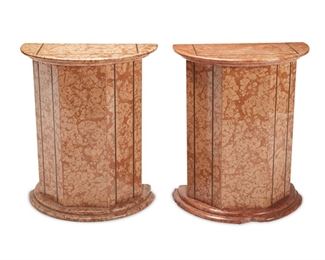 1144
A Near-Pair Of Demi-Lune Marble Console Tables
20th Century
Each column-form side table in coral-colored marble with brass inlay, 2 pieces
Each: 28" H x 23.5" W x 13.25" D
Estimate: $300 - $500