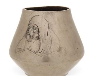 1160
A Chinese Silvered Bronze Vase
20th Century
Signed in Chinese characters
The silvered bronze vase with a bas-relief portrait of a bearded man
7.25" H x 8" Dia.
Estimate: $400 - $600