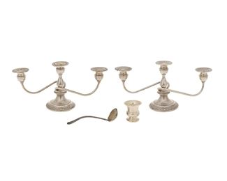 1178
A Group Of Sterling Silver Table Items
20th Century
Comprising a pair of weighted convertible candlesticks (each candlestick at tallest: 13" H x 12.25" W x 4" D), a small weighted hollow-ware cup (1.625" H x 2.5" Dia.), and a Gorham serving ladle (6.625" L), 4 pieces
Weighable sterling: 1.97 oz. troy approximately
Estimate: $200 - $400