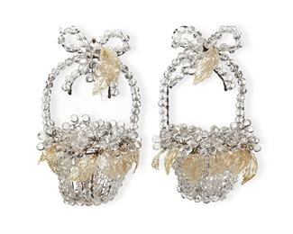 1200
A Pair Of Italian Crystal Wall Sconces
20th Century
Each in the form of a basket with a bow, composed of glass bead chains and pale yellow glass leaves, electrified, 2 pieces
Each: 12.5" H x 7.5" W x 4" D
Estimate: $300 - $500