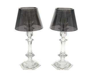 1203
A Pair Of Baccarat "Harcourt Our Fire" Candlesticks By Philippe Starck
20th Century
Each etched: Baccarat / By Starck / Flos Tech / France; Numbered: 512 / 366
Designed by Philippe Starck, each crystal candle lamp with a knopped column and smoked glass shade, 2 pieces
Each: 12.75" H x 6" Dia.
Estimate: $1,000 - $1,500