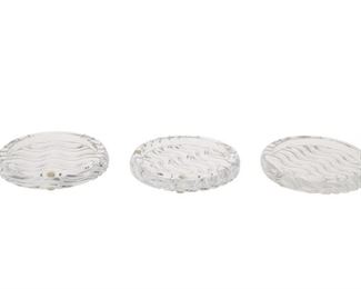 1204
Three Baccarat Crystal "Wave" Coasters
20th Century
Each etched: Baccarat / France
Each crystal coaster/ash tray with a molded wave pattern to the underside, 3 pieces
Each: 0.75" H x 5.25" Dia.
Estimate: $250 - $450