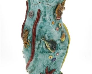 1205
An Italian Amalfi Coast Pottery Vase
Mid-20th Century; Vietri, Italy
Signed: Pinto [I] / Vietri / Italy
The free-form earthenware vase with high-relief applied sea creatures on an aqua blue ground
15" H x 7" Dia.
Estimate: $400 - $600
