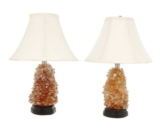 1221
A Pair Of Rock Crystal Table Lamps
Late 20th/Early 21st Century
Each affixed with an arrangement of tumbled quartz, together with contemporary shades, electrified, 2 pieces
Each overall: 19.25" H x 13" Dia.
Estimate: $400 - $600
