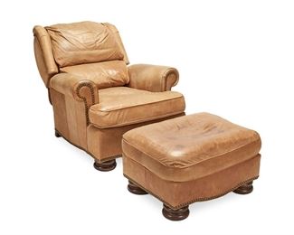 1226
A Contemporary Drexel Heritage Leather Club Chair With Ottoman
1995
With maker's label to underside; dated: 4/21/95
The armchair in camel leather upholstery with rolled arms, nail head trim, and loose cushions raised on bun feet, accompanied by a conformingly designed ottoman, 2 pieces
Chair: 38" H x 36" W x 34" D; Ottoman: 16" H x 29" W x 22" D
Estimate: $300 - $500