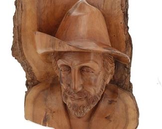1236
A Swiss Carved Wood Portrait Of A Man
20th Century
Unsigned
Carved from a solid trunk with bark remaining on verso, depicting a man wearing a hat
12.375" H x 12" W x 8.5" D
Estimate: $200 - $300