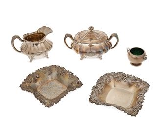 1243
A Group Of Sterling Silver Holloware Items
Late 19th/Early 20th Century
Each marked for sterling, with various maker's marks
Comprising a matching creamer and sugar bowl set, two small dishes, and an enamel lined salt cellar, 5 pieces
Larger: 4" H x 6.25" W x 3.75" D; Smaller: 1.5" H x 2.625" W x 2" D
21.375 gross oz. troy approximately
Estimate: $500 - $700