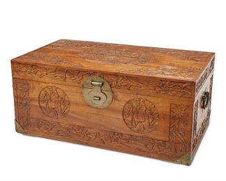 1249
A Thai Carved Wood Chest
20th Century
With floral motifs and chased brass lock plate
18" H x 42" W x 24" D
Estimate: $100 - $200