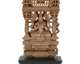 1253
An Indian Carved Wood Sculpture Of Vishnu
20th Century
The carved wood sculpture depicting a seated Vishnu within a temple structure on an ebonized wood base
13.75" H x 7.5" W x 3" D
Estimate: $300 - $500