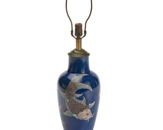 1261
A Chinese Porcelain Table Lamp Base
Late 19th/Early 20th Century
The single-light lamp base with blue porcelain body and polychrome painted koi fish, electrified
32.5" H x 6.5" Dia.
Estimate: $300 - $500