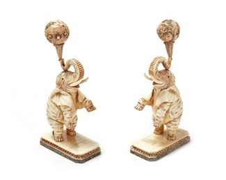 1272
A Pair Of Chinese Bone Veneer Elephant Figures
20th Century
Each with zhuanshu seal mark to underside
Each depicting a rearing elephant balancing a ball, 2 pieces
Each: 16" H x 4.5" W x 8.25" D
Estimate: $400 - $600