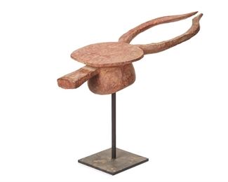 1273
An African Katana Mask
20th Century
The carved wood mask with traces of pigments
5.5" H x 9.5" W x 29" D
Estimate: $700 - $900