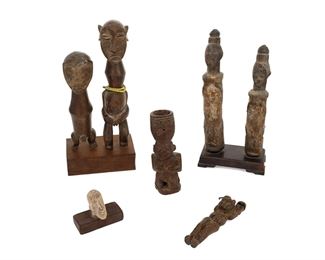 1281
A Group Of African Figures
20th Century
Comprising carved wood and carved stone figures of various forms, one with beaded element, 5 pieces
Larger: 11" H x 5.25" W x 3.25" D
Estimate: $200 - $400