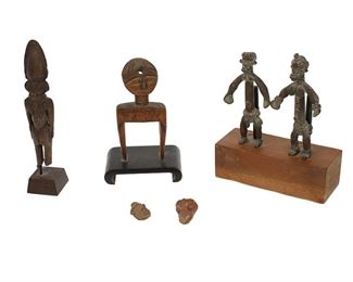 1282
A Group Of African Figures
20th Century
Comprising a pair of brass figures and two carved wood figures, 3 pieces
Larger: 8" H x 1.75" W x 1.75" D; Smaller: 6.5" H x 4.125" W x 3" D
Estimate: $400 - $600