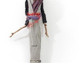 1294
A Contemporary Fetish-Style Figural Wall Sculpture
Fourth-Quarter 20th Century
Appears unsigned
Wood, fabric, glass beads, and metal charms
38" H x 17" W x 4" D
Estimate: $100 - $200