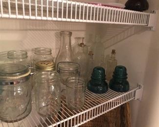 Old bottles and blue insulators