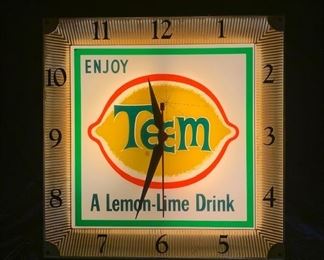 6. Teem "Enjoy a Lemon-Lime Drink" Lighted Clock