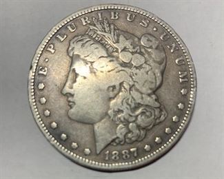 56. 1887 O Morgan Silver Dollar