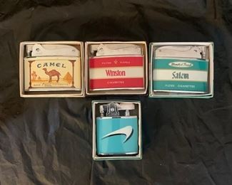 65. Vintage Camel. Winston, Salem, and Newport Cigarette Lighters in box