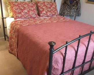 Queen-size wrought iron bed and mattress set