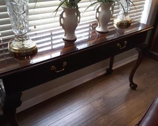 Very pretty console table.