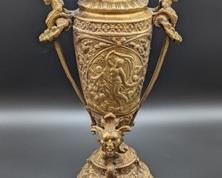 Ornate Brass Vintage Urn with Figural Handles, Masks and engraved figurines. Features a unique and gorgeous  raised relief design