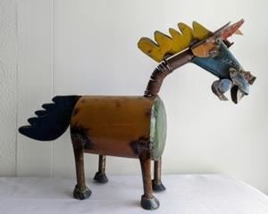 Painted Metal Donkey Sculpture. Super awesome reclaimed metal donkey! Measures 30” wide and 22” high.