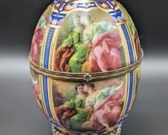 Vintage Porcelain Egg Trinket Box. There are no markings and the egg is in excellent condition. Measures 8” high and 5” wide.