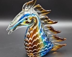 Murano Glass Horse Head. A fine piece of craftsmanship from Murano! A beautiful and colorful piece! Measures 8” high and 6” wide at the base.
