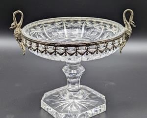 Vintage Footed Bowl with Silver Plated Swan Rim. The plated rim is a little loose. Measures 7” in diameter and 6” high.